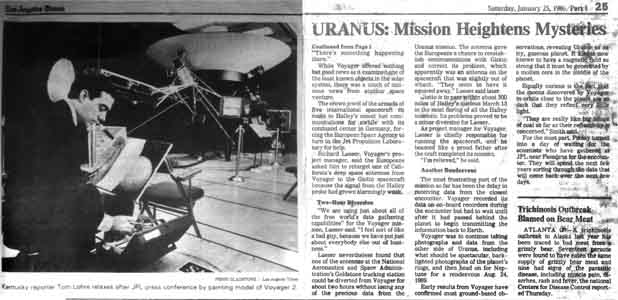 Tom Lohre painting Voyager  II at the Jet Propulsion Laboratory during its encounter with Uranus.